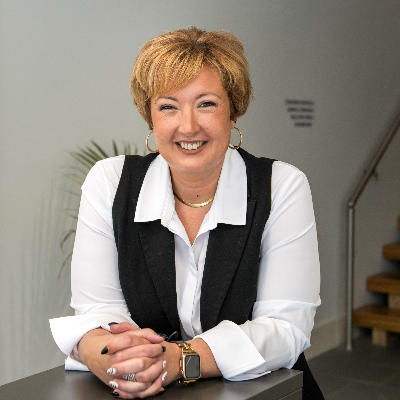 Jaclyn smiling at the camera.